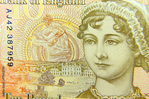 London, UK, 2 January 2024: Close up of the reverse of a £10 note from the United Kingdom featuring a portrait of the author Jane Austen with with selective focus  photo