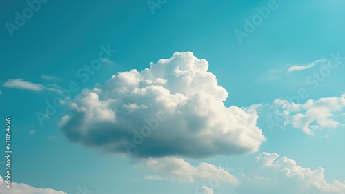 Cumulus clouds in a bright blue sky, closer view