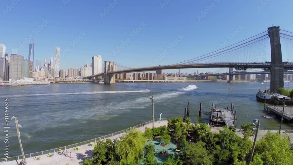 East River with vessels near Brooklyn Bridge and Manhattan East River with vessels near Brooklyn Bridge and Manhattan