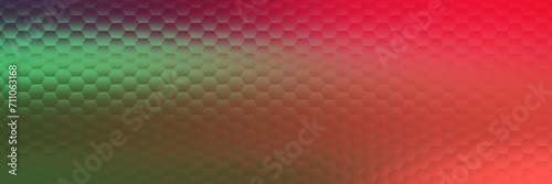 Abstract panoramic geometric background with many hexagons arranged on a gradient from dark green to red. This pattern creates a feeling of depth and three-dimensionality