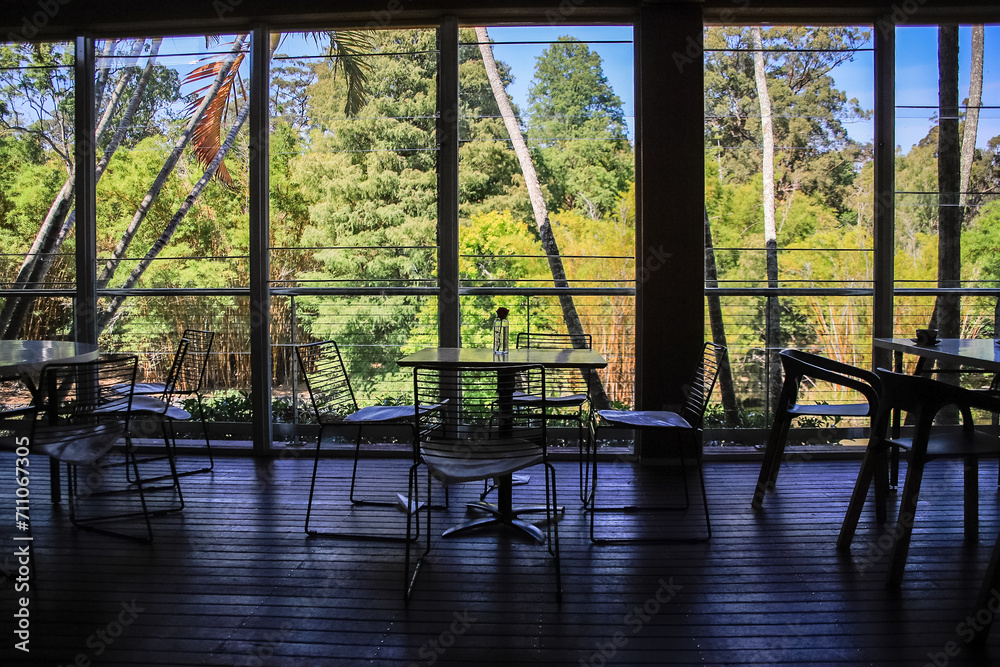 A Peaceful Retreat: Indoor Seating Overlooking Lush Greenery