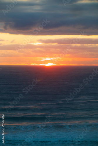 A Golden Dawn Breaks Over Gold Coast   s Tranquil Sea