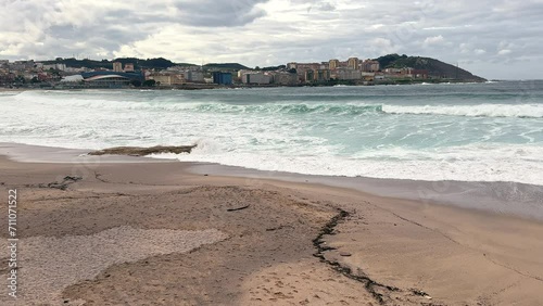 Wallpaper Mural Seaside Serenity: Waves Embrace the Sandy Shores Torontodigital.ca