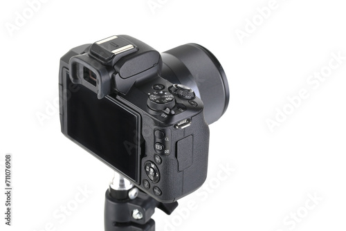 Black and Modern digital mirrorless Camera with lens on white background. photo