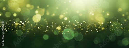 Abstract emerald green and yellow glitter bokeh background. Festive backdrop for St. Patrick's Day, christmas, spring, holiday or event