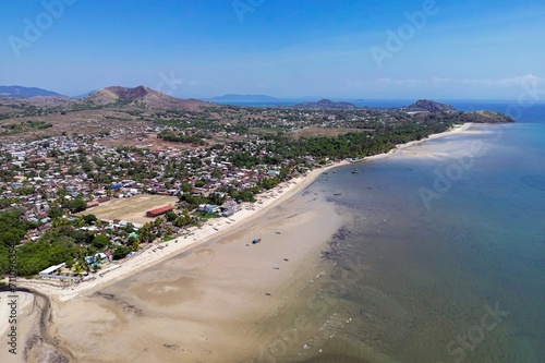 Dzamandzar town and beach on the island of Nosy in Madagascar, aerial view