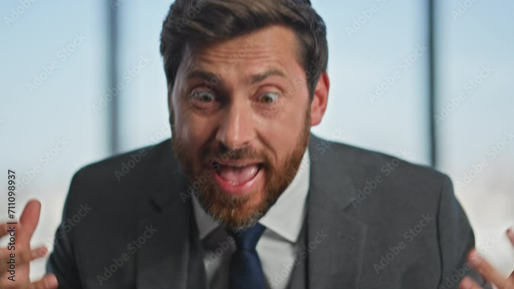 Annoyed manager arguing online call in office closeup. Stressed man discussing Annoyed manager arguing online call in office closeup. Stressed man discussing