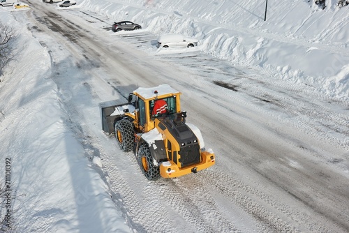 Winter road clearing snowplow