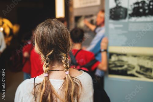 Obraz na plátne Group of students and school pupils in a science museum exhibition, excursion to