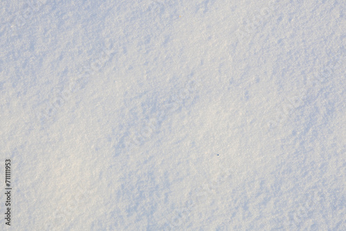 Texture surface of snow. Background with selective focus and copy space