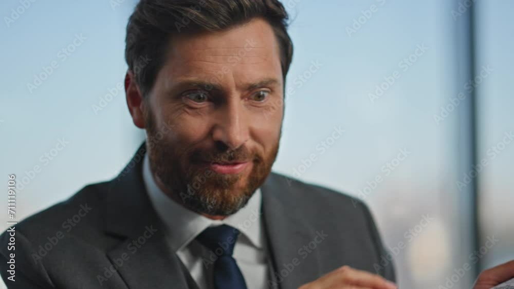 Smiling boss talking online closeup. Positive man holding successful contract Smiling boss talking online closeup. Positive man holding successful contract
