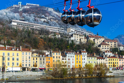 Image of aerial view of Grenoble with French Alps and cable car, France