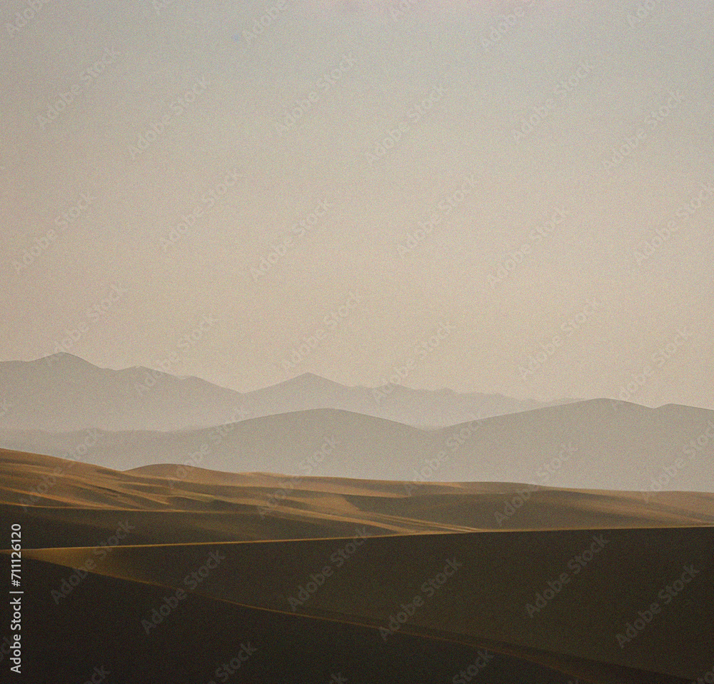 Obraz premium Landscape with fog. misty morning in the mountains. Minimalist background with empty copy space. Nature backdrop. Beautiful natural flyer, card design. Nature Template for presentation or product.