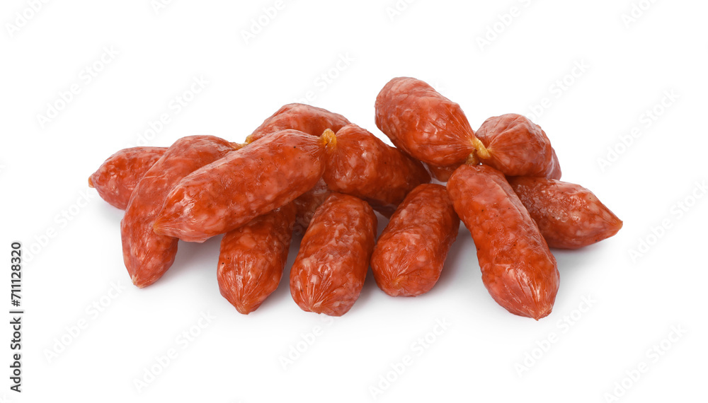 Many thin dry smoked sausages isolated on white Many thin dry smoked sausages isolated on white