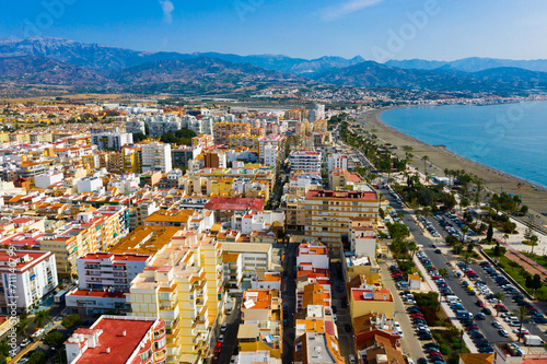 Picturesque summer view from drone of coastal Mediterranean town of Torre del Mar, Andalusia, Spain.. photo