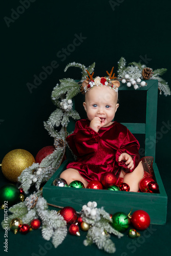 children's New Year's photo shoot. Christmas baby. Christmas card with baby