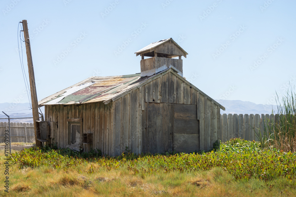 An old barn structure found in the Sierra Nevada Mountains in California. An old barn structure found in the Sierra Nevada Mountains in California.