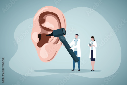 Doctors diagnose human ear. World hearing day.