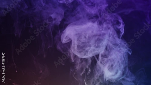 Smoke texture on black background in blue neon light. Smoking, steam clouds of vapour close-up. Burning, fog.  photo