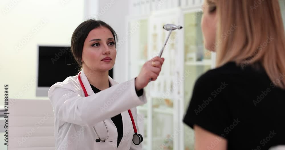 Woman doctor checks lady reaction in office of hospital Woman doctor checks lady reaction in office of hospital