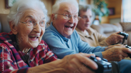 Group of happy senior people play videogame together. Elderly people doing hobby and activity.