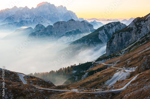 Road on Mount Mangart Saddle in Autumn Misty Afternoon - Julian alps, Slovenia Europe