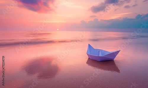 Tranquil Seascape with Colorful Sunset and Paper Boat on Sandy Beach