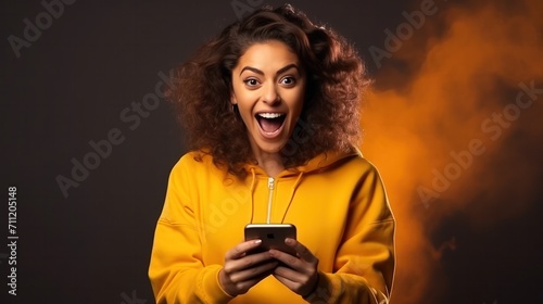 excited play games by mobile phone make winner gesture. winning mobile gambling. Wow face expression. Esport streaming game online, surprise, gamer, online, earning, new generation.