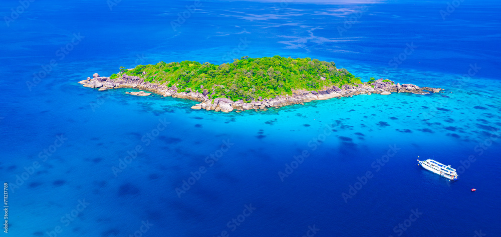 Aerial view of the Similan Islands, Andaman Sea, natural blue waters, tropical sea of Thailand. The islands are shaped like a heart, the beautiful scenery of the island is impressive.	
