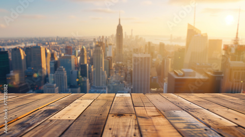 Elevated View of a Wooden Platform Overlooking a Sunlit City Skyline at Dawn