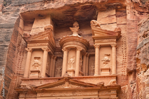 The upper part of main fasade of the Al Khazneh - the Nabatean temple in the Nabatean Kingdom of Petra in the Wadi Musa city in Jordan