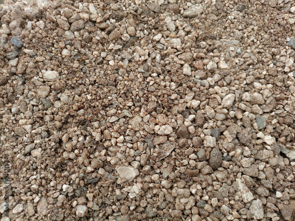 Brown white pebbles texture blur background. Brown white pebbles texture blur background.