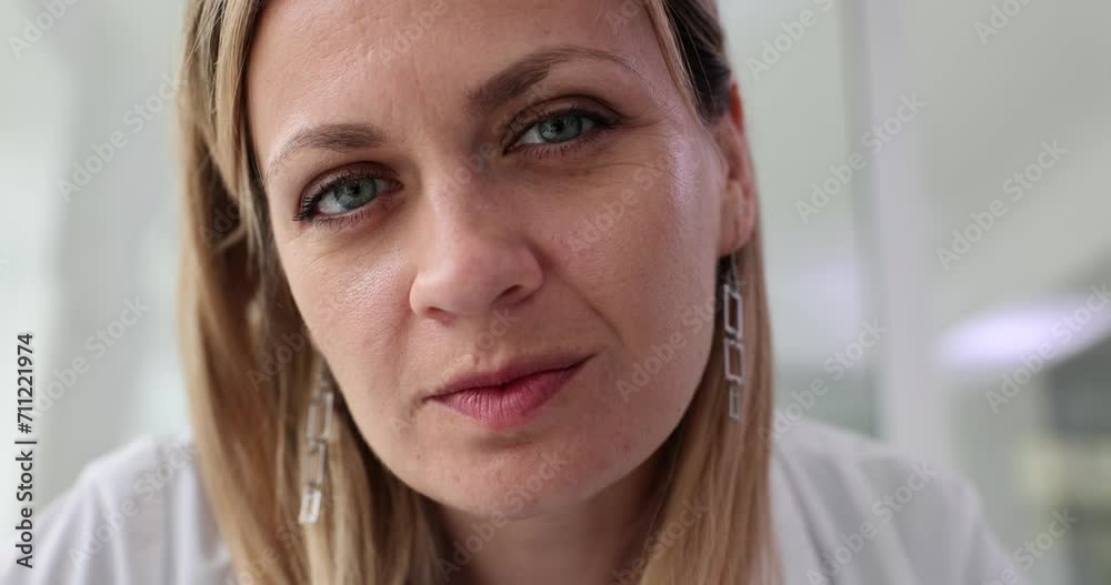 Approaching face of woman therapist in office surrounding Approaching face of woman therapist in office surrounding