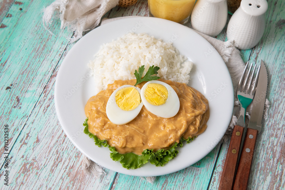 Aji de gallina chicken spicy cream served with rice traditional peruvian food Aji de gallina chicken spicy cream served with rice traditional peruvian food