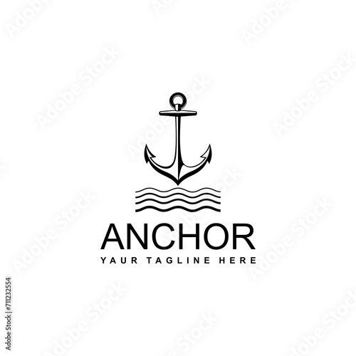 The logo of anchor in the sea waves