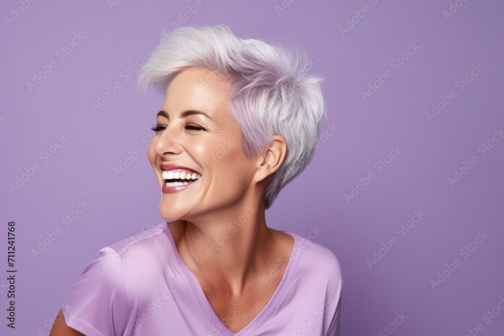Beauty portrait of a beautiful woman with short white hair on a purple background