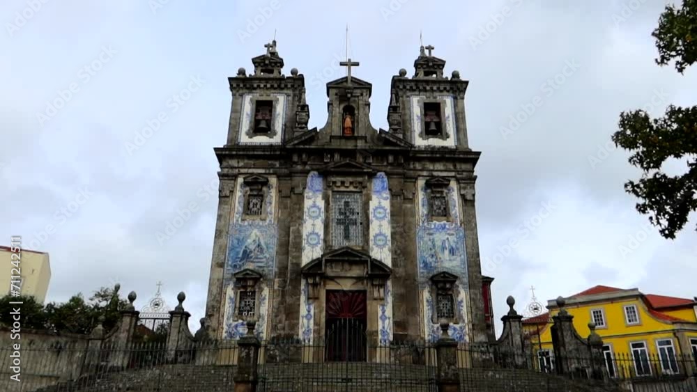 Unique church of Igreja de Santo Ildefonso in Porto with blue and white tiles of facade Unique church of Igreja de Santo Ildefonso in Porto with blue and white tiles of facade