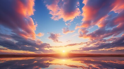 Beautiful orange and purple hues of the sky and clouds during sunset over the horizon