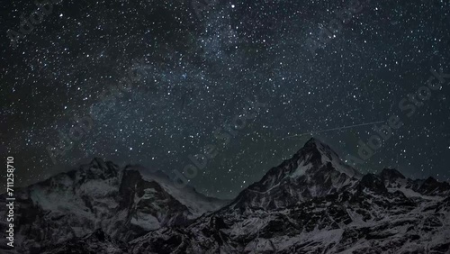 timelapse of night sky over Annapurna- Annapurna south viewed from Khopra ridge photo