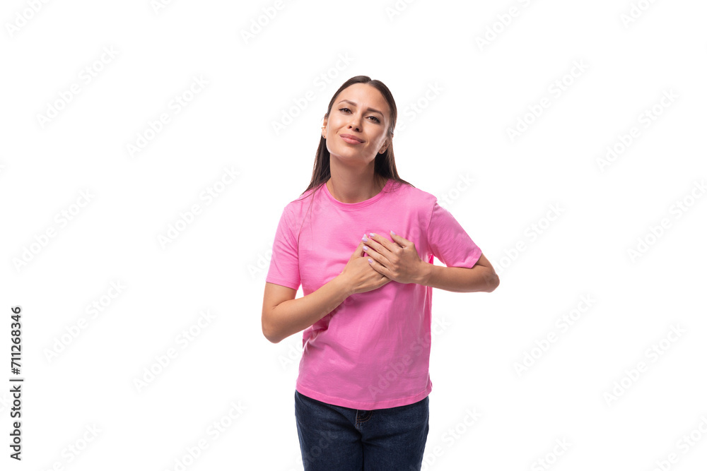 young well-groomed european woman with black straight hair is dressed and wearing jeans. people lifestyle concept young well-groomed european woman with black straight hair is dressed and wearing jeans. people lifestyle concept