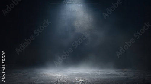 A dark room with a concrete floor and a spotlight. Suitable for dramatic or mysterious themed designs, theater and event promotion, and creative storytelling visuals. empty dark blue room