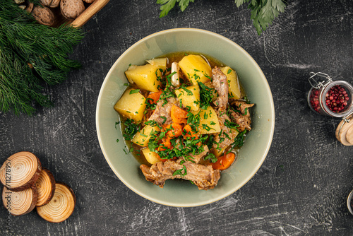 Fototapeta Naklejka Na Ścianę i Meble -  Portion of prepared stewed potatoes with meat