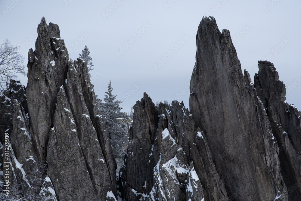 Group of Snow-Covered Rocks in a Winter Landscape Group of Snow-Covered Rocks in a Winter Landscape