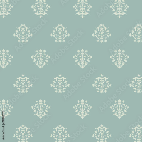 Mughal flower motif pattern with green blue background photo