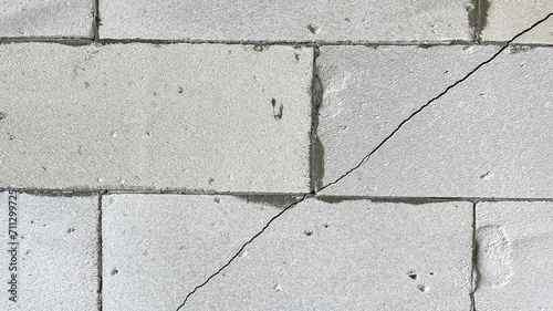 Bild auf Leinwand a crack in gas block wall, defective wall, cracked masonry, Cracks on wall, Low-