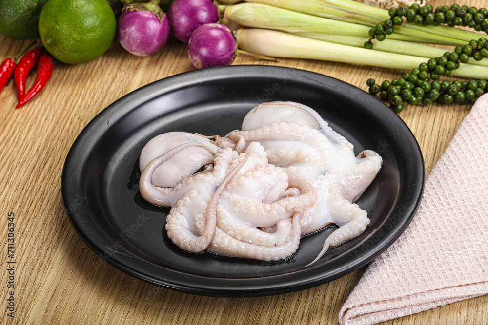 Delicous fresh raw uncooked octopus Delicous fresh raw uncooked octopus