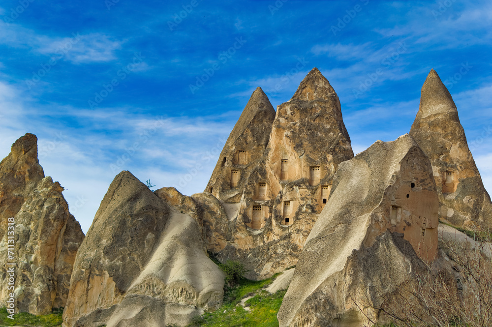 Typical Cappadocia landscape soft volcanic rock, shaped by erosion in Goreme, Turkey.