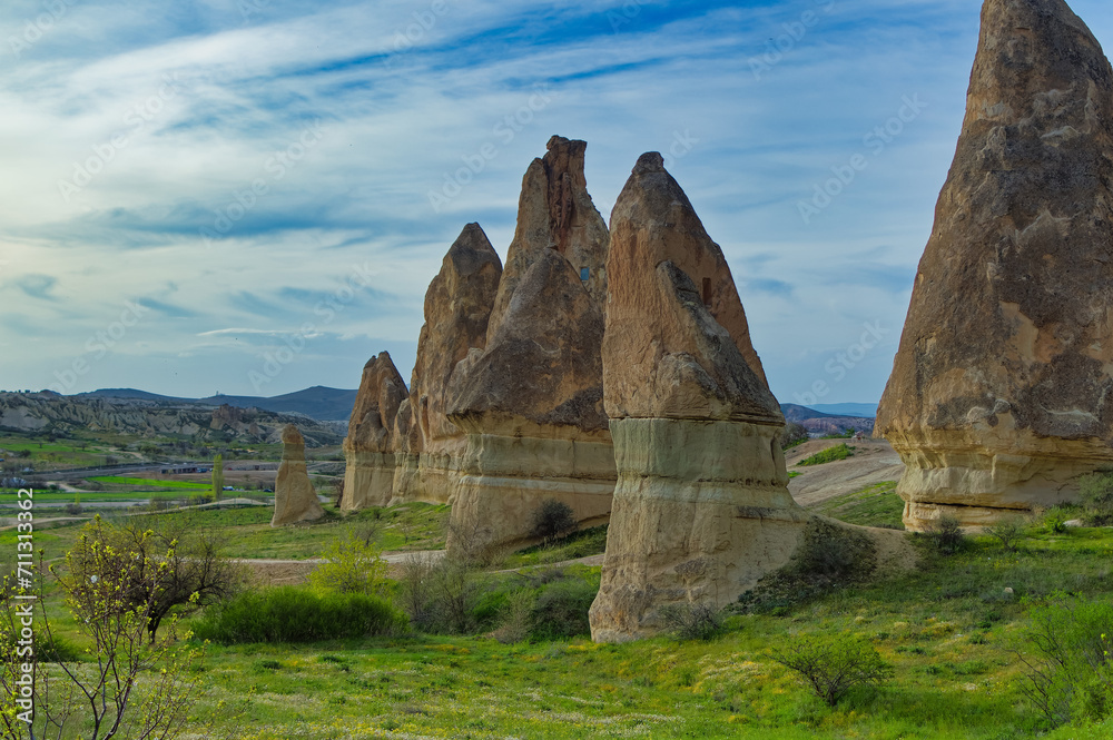Typical Cappadocia landscape soft volcanic rock, shaped by erosion in Goreme, Turkey.