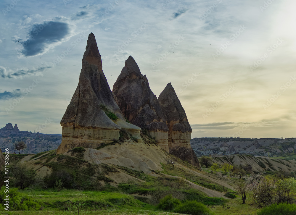 Typical Cappadocia landscape soft volcanic rock, shaped by erosion in Goreme, Turkey.