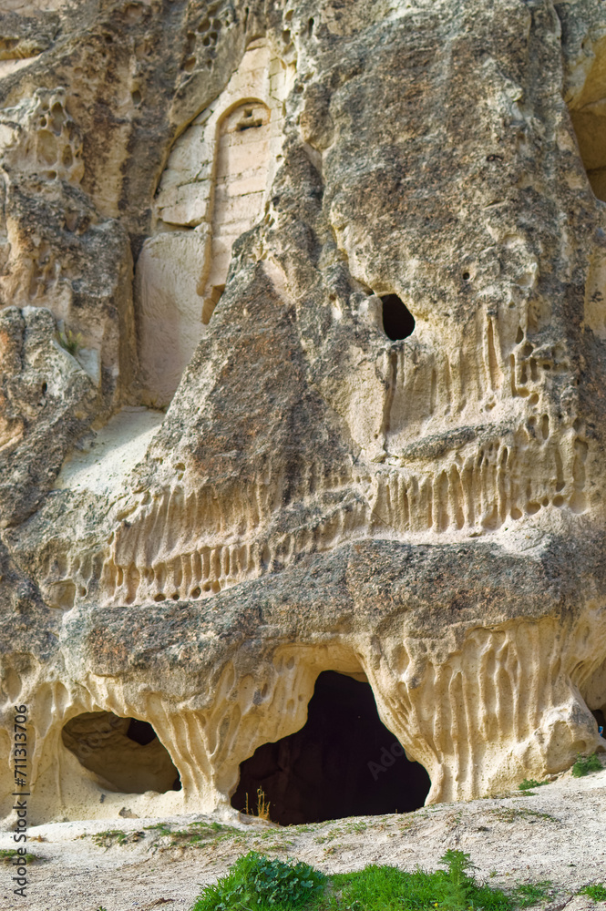 Typical Cappadocia landscape soft volcanic rock, shaped by erosion in Goreme, Turkey.